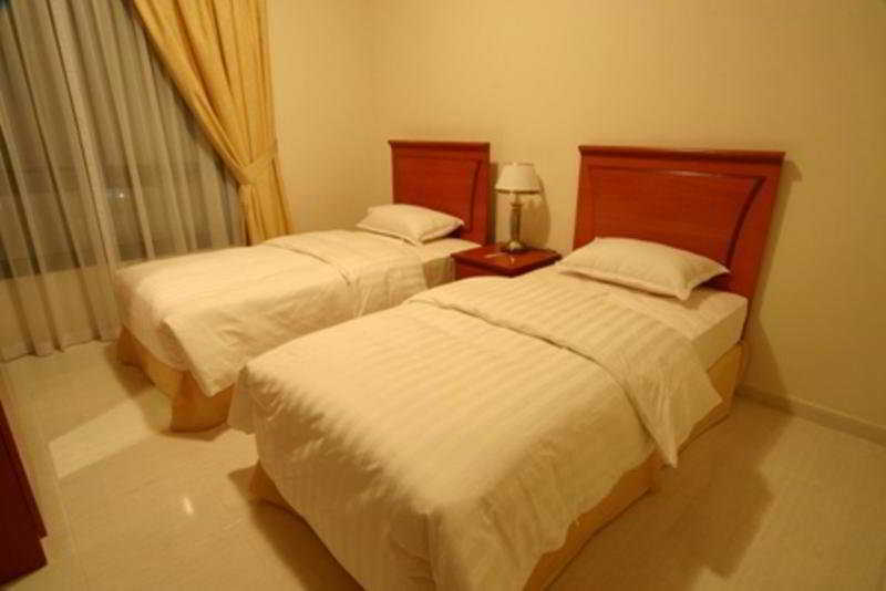 Emirates Palace Hotel Suites Sharjah Room photo